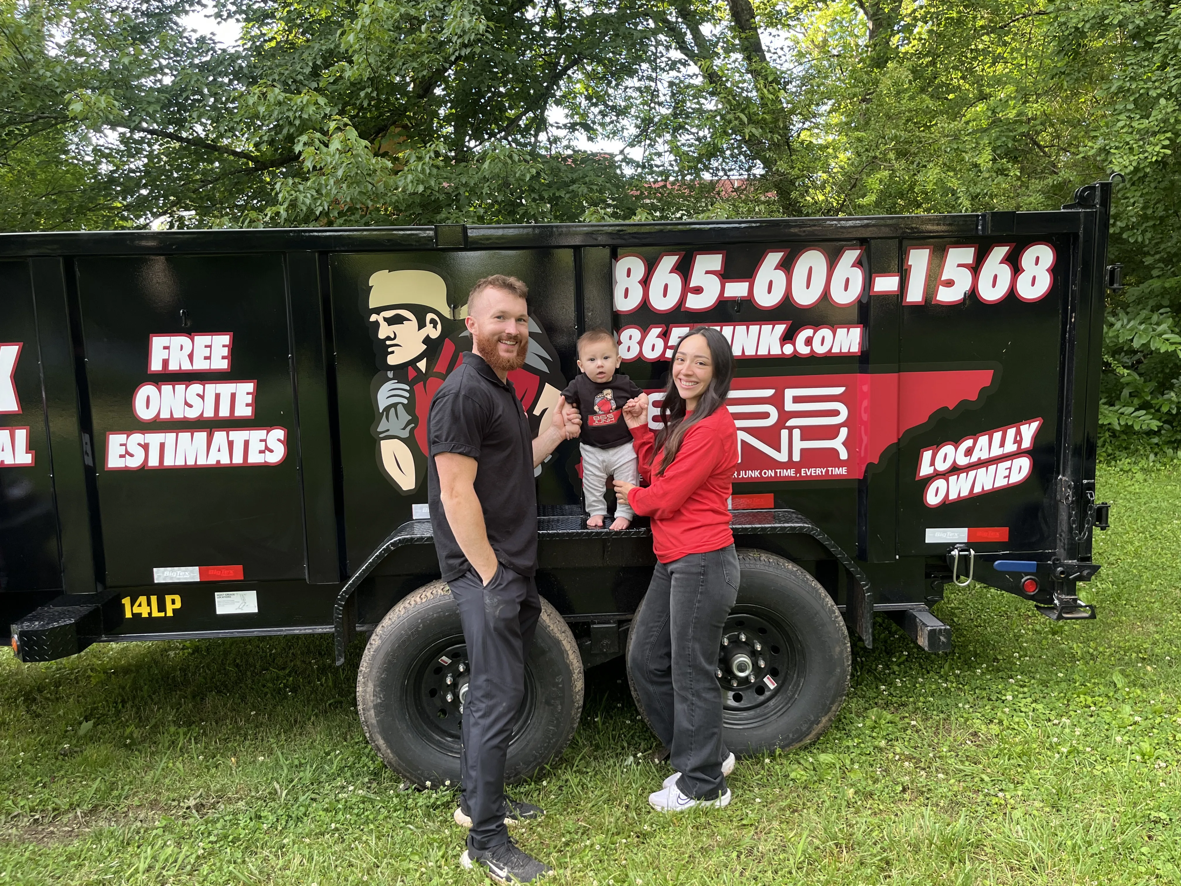 Dylan Snapp and family standing beside the 865 Junk trailer